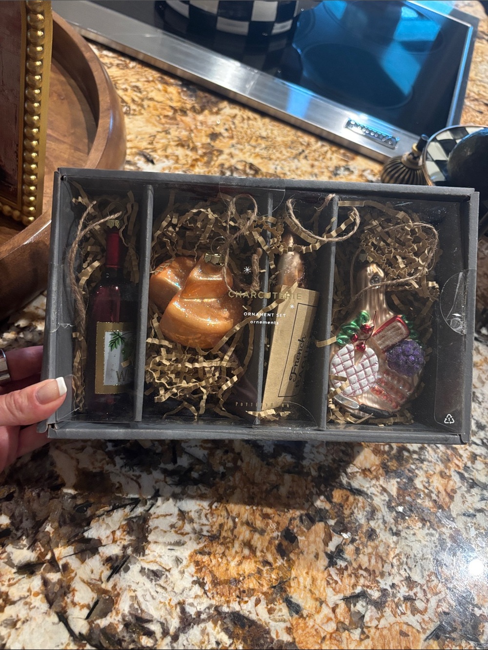 Pottery Barn set up for charcuterie, wine, cheese, and bread ornaments